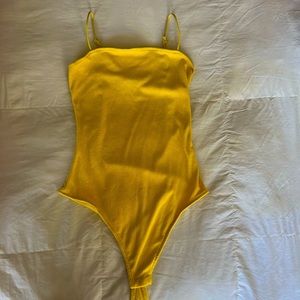 Yellow body suit